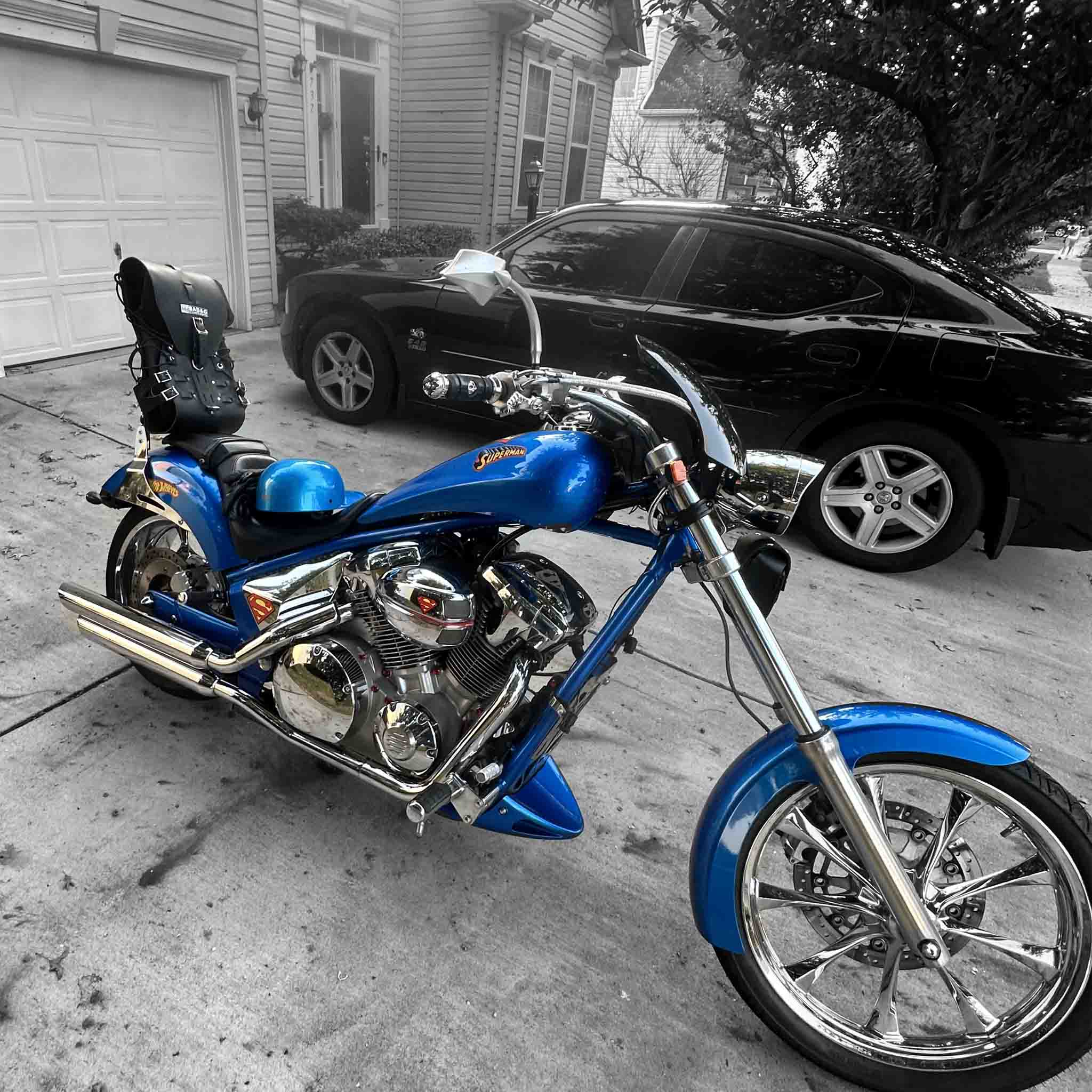 Right side riding stance—dual roll-top dry bag secured on Honda Fury