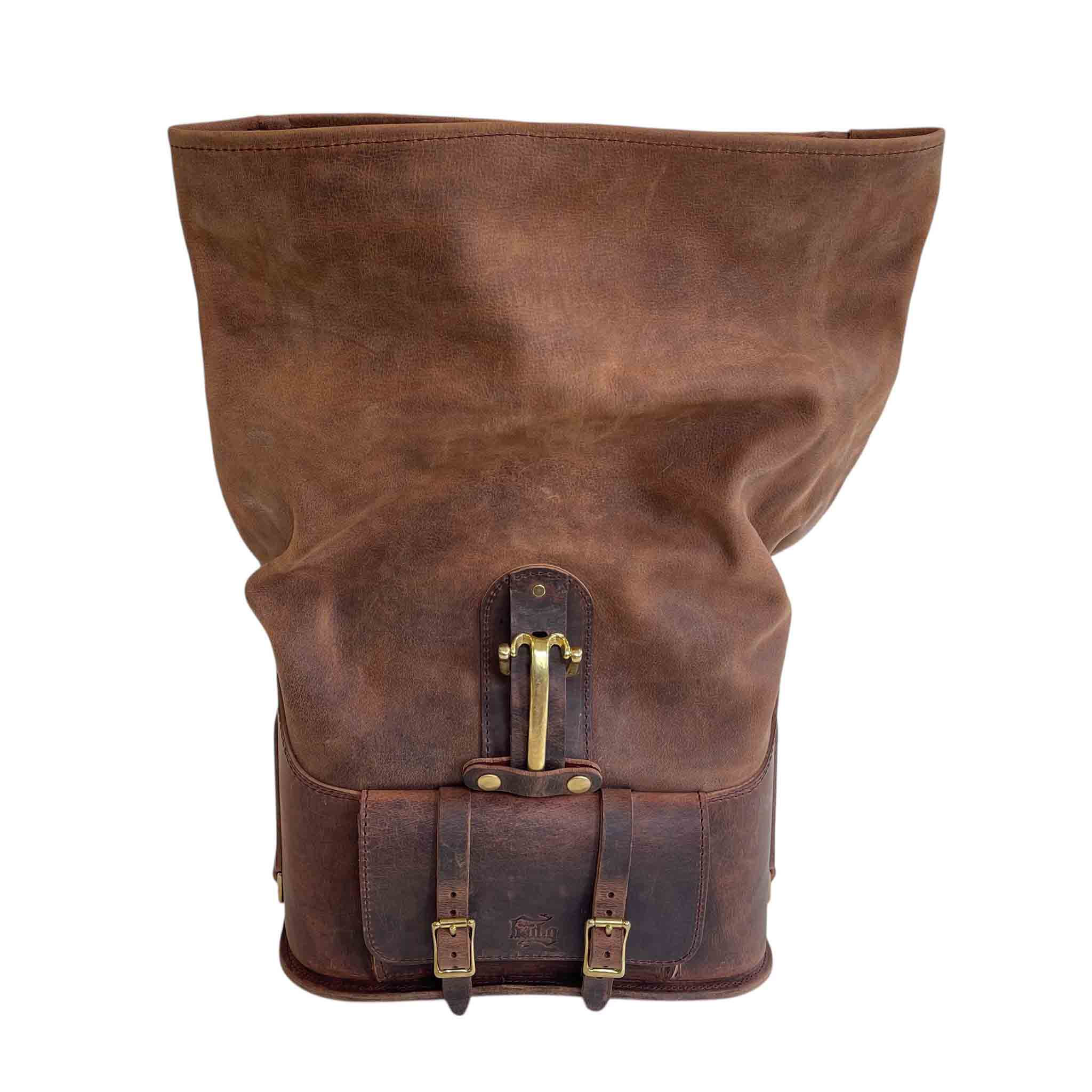 Triumph Bonneville Bobber Panniers Rolltop Swingarm Saddlebags. Hand crafted in USA with premium veg tan water buffalo leather, waterproof liners and solid brass hardware. BAD&G Customs TBP01